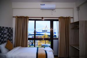 Uma cama ou camas num quarto em Hotel Kaavi