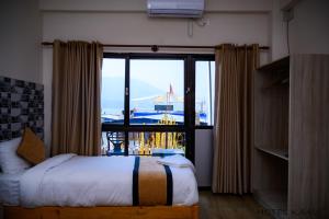Uma cama ou camas num quarto em Hotel Kaavi