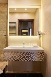 Ένα μπάνιο στο Apartment am Kurpark