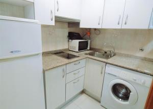 Kuchyň nebo kuchyňský kout v ubytování Apartamento Cumbremar superior Orange Costa + 2 fotografie