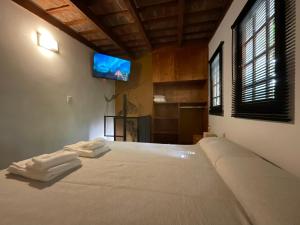 Encantador Duplex cerca de todo客房内的一张或多张床位