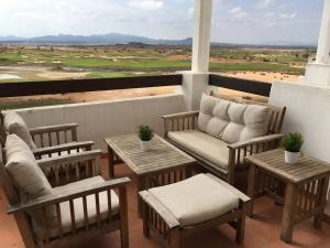 Posezení v ubytování Precioso Ático en primera línea de Golf