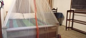 Ein Bett oder Betten in einem Zimmer der Unterkunft Surf Forever