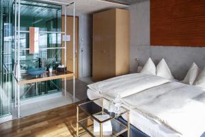 Hotel Ochsen by Mountain Hotels客房内的一张或多张床位
