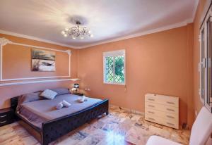 Posteľ alebo postele v izbe v ubytovaní Villa Domus Vesta