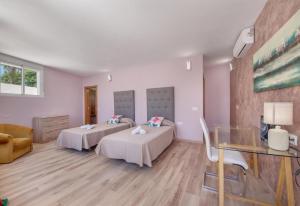 Posteľ alebo postele v izbe v ubytovaní Villa Domus Vesta