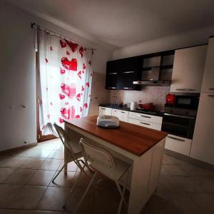 Kuchyňa alebo kuchynka v ubytovaní Roxy Bellavista