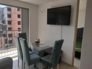 TV a/nebo společenská místnost v ubytování APARTAMENTO EN FLANDES