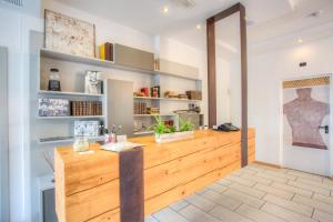 Kuchyň nebo kuchyňský kout v ubytování D-Place Hotel & Suite