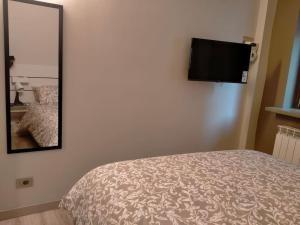 Ένα ή περισσότερα κρεβάτια σε δωμάτιο στο Smart Home Centro Storico