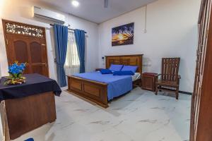 Ένα ή περισσότερα κρεβάτια σε δωμάτιο στο Villa Talpe Inviting 5 Bedrooms & Massage Pool