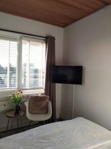 Postel nebo postele na pokoji v ubytování Appartement Zuid 5
