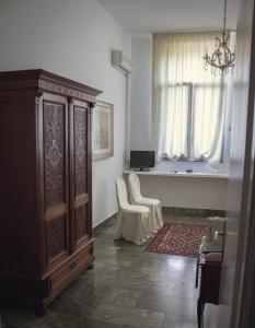 Posezení v ubytování Villa Carrer + 26 fotografií