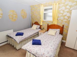 Postel nebo postele na pokoji v ubytování Bank House