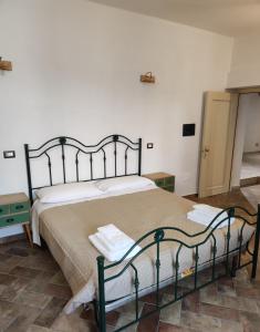 Giường trong phòng chung tại Le Stanze dello Spassetto