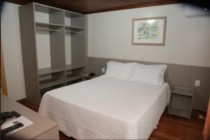 Katil atau katil-katil dalam bilik di Letto Hotel Flores da Cunha +71 gambar