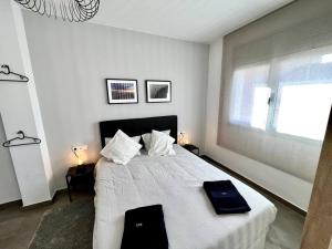 Łóżko lub łóżka w pokoju w obiekcie Loft moderno en buena ubicación