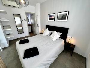 Łóżko lub łóżka w pokoju w obiekcie Loft moderno en buena ubicación