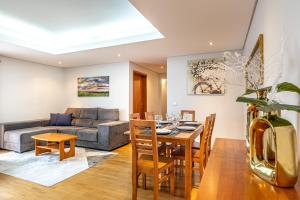 Posezení v ubytování Machico City Apt