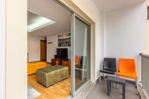 Posezení v ubytování Machico City Apt