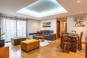 Posezení v ubytování Machico City Apt