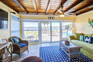 a living room with a couch and a table at 3170 S Peninsula Drive in Daytona Beach