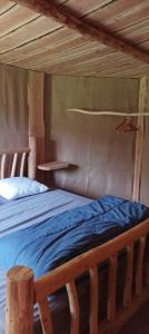 Posteľ alebo postele v izbe v ubytovaní Cabanes des Landes- cabane sur pilotis