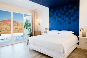 Ein Bett oder Betten in einem Zimmer der Unterkunft Skyview Hotel