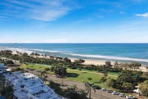 an aerial view of the beach and the ocean at Beach Front Ocean View 3 Bedroom Apartment in Maroochydore in Maroochydore