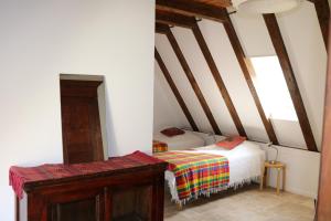 Postel nebo postele na pokoji v ubytování Oltarcie - Maison d'hôte avec piscine