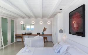 Cama ou camas em um quarto em She Mykonos - The Residency