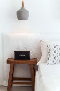 Cama ou camas em um quarto em She Mykonos - The Residency
