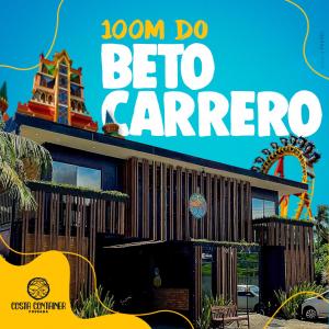 a poster for aedia carride with a guitar in front of a store at Pousada Costa Container in Penha