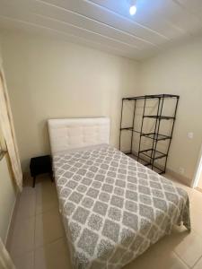 Cama o camas de una habitación en Aconchego Petrópolis