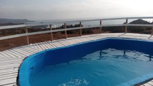 Bazén v ubytování Cabaña 8 personas frente al mar nebo v jeho okolí