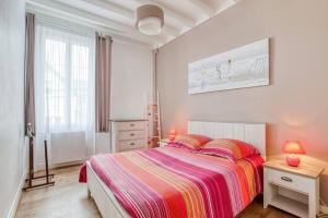 Postel nebo postele na pokoji v ubytování Villa Carnot - 300m de la Plage
