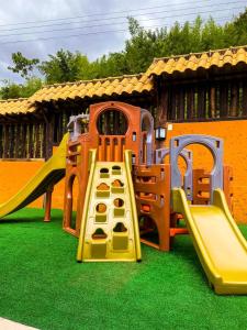 a playground with a slide at Recanto Serra do Trovão in Ouro Preto