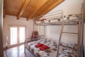 A bed or beds in a room at Casa del Sole - Pianello del Lario by LoveComo