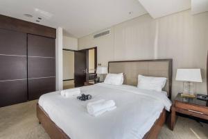 Postel nebo postele na pokoji v ubytování 1 bed apartment in 5 star hotel