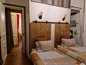 Кровать или кровати в номере B & B Les Secrets des Loges