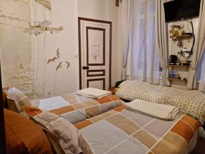 Кровать или кровати в номере B & B Les Secrets des Loges