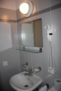 Vonios kambarys apgyvendinimo įstaigoje Garni Bar Sport