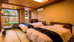 Легло или легла в стая в Yukai Wanwan Resort Katayamadu Powered by Wanwan Paradise