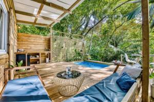 A garden outside Monkey Tiny House - Private swimming pool