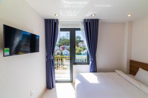 Voodi või voodid majutusasutuse Đà Lạt Cao Nguyên Hotel toas