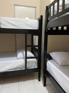 Μία ή περισσότερες κουκέτες σε δωμάτιο στο Hostel dos Poetas