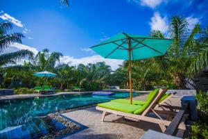 Bazén v ubytování Palm Pran Resort nebo v jeho okolí