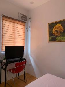 TV a/nebo společenská místnost v ubytování VRT Brilliant Hotel