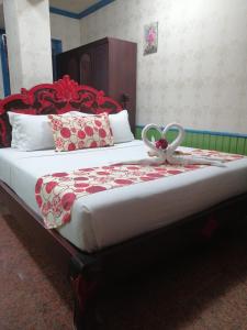 Letto o letti in una camera di Sang Yoo Mountain View Tagaytay Bed and Breakfast - Taal Lake View