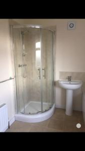 a bathroom with a shower and a sink at Challoner House - sleeps 5 in Hartlepool